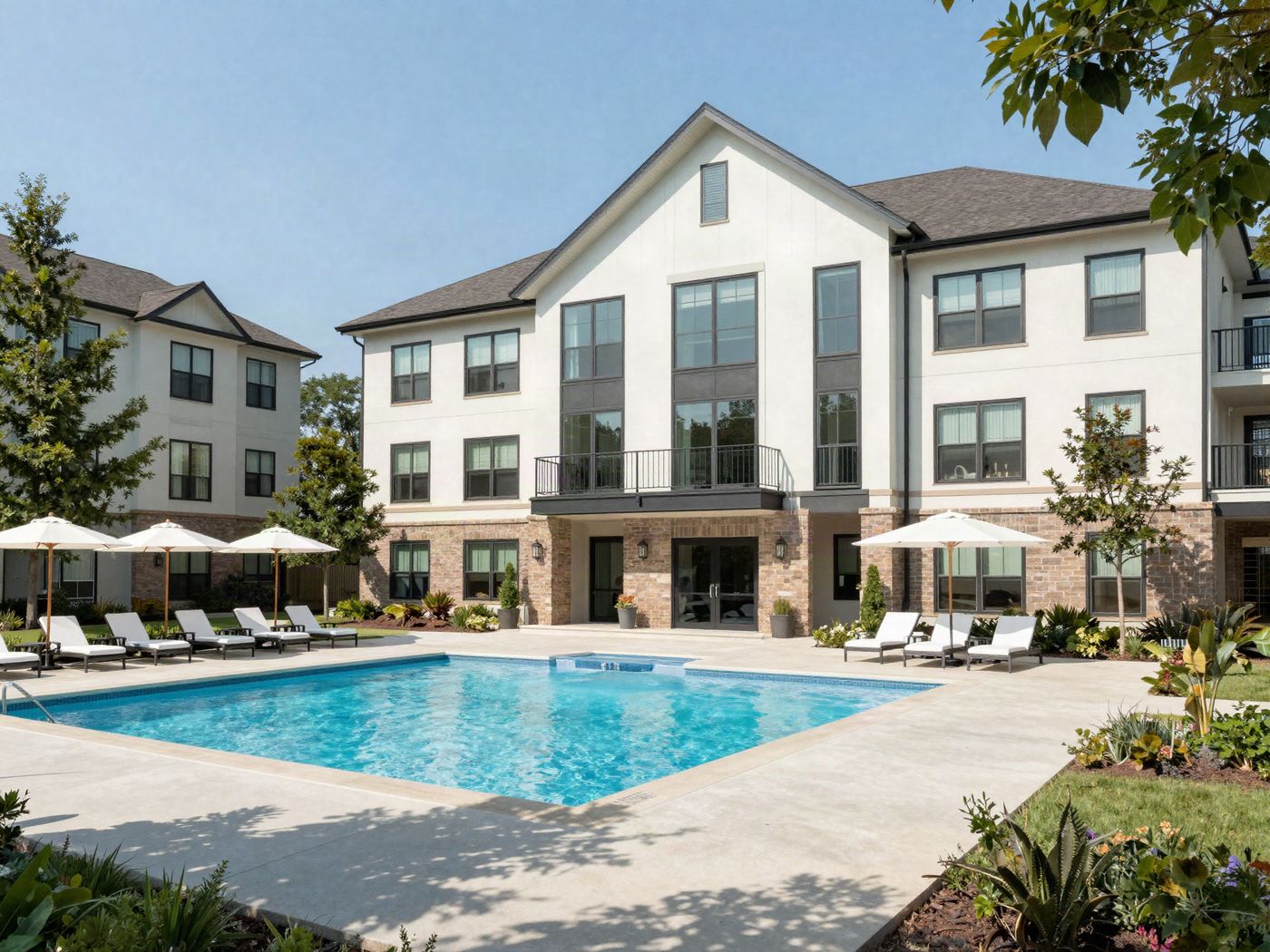 The clubhouse and resort-style pool with a sundeck, lounge chairs and cabanas